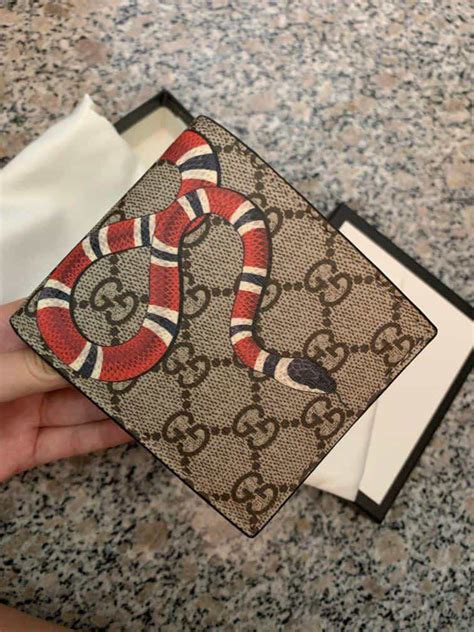 how much does a fake gucci wallet cost|how to spot a Gucci wallet.